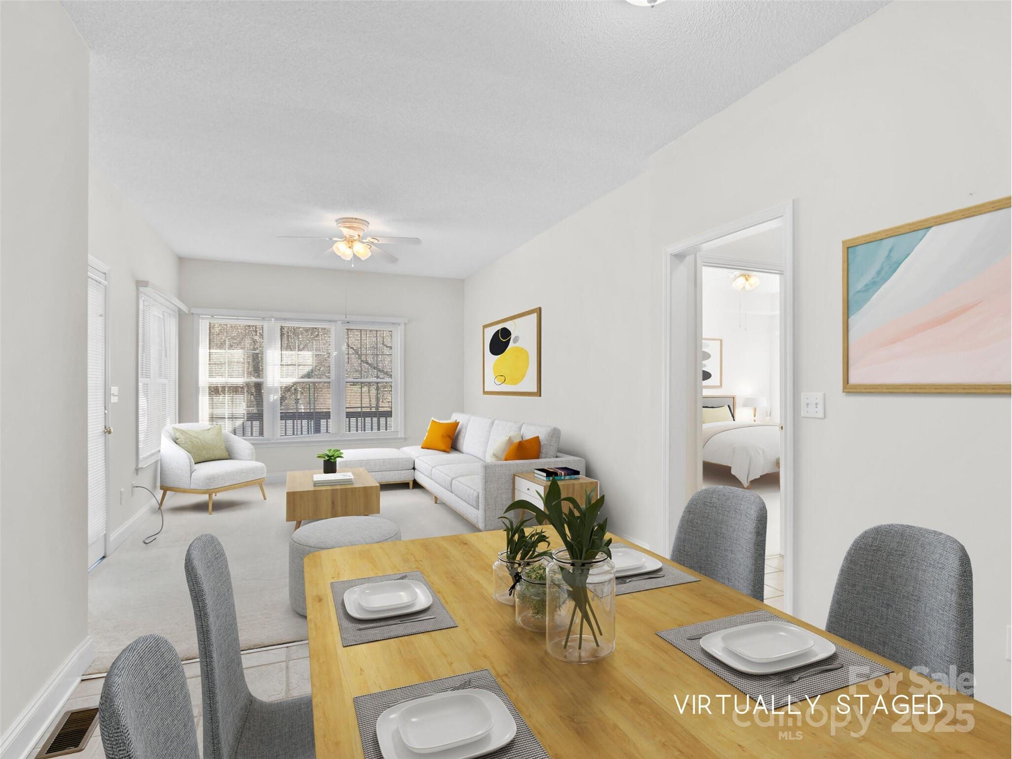 72 Classic Oaks Circle Hendersonville, NC 28792 - Photo 17 of 39 a living room with furniture and a table