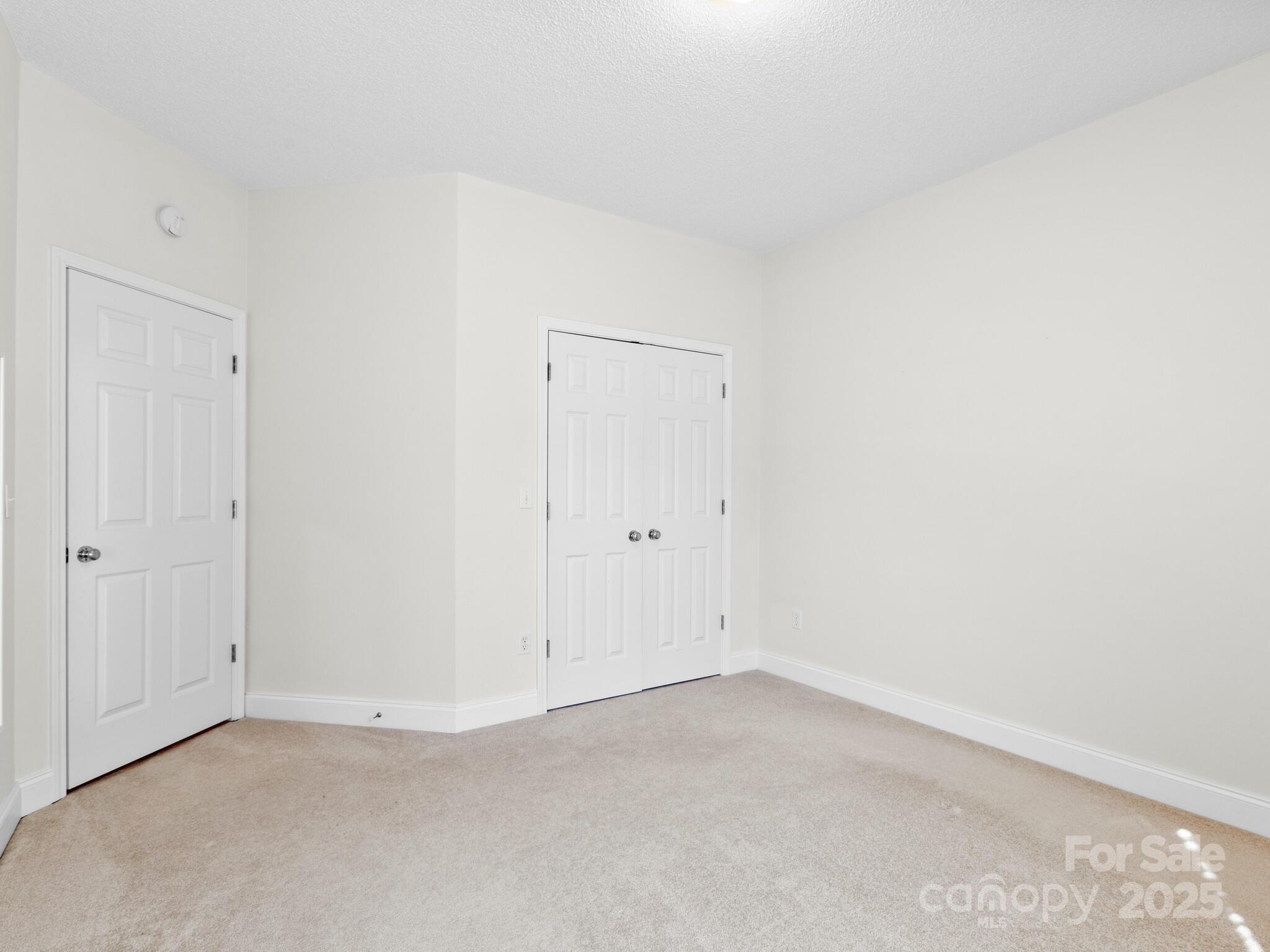 72 Classic Oaks Circle Hendersonville, NC 28792 - Photo 24 of 39 a view of an empty room