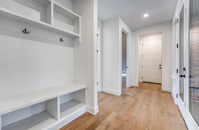 a view of entryway with wooden floor