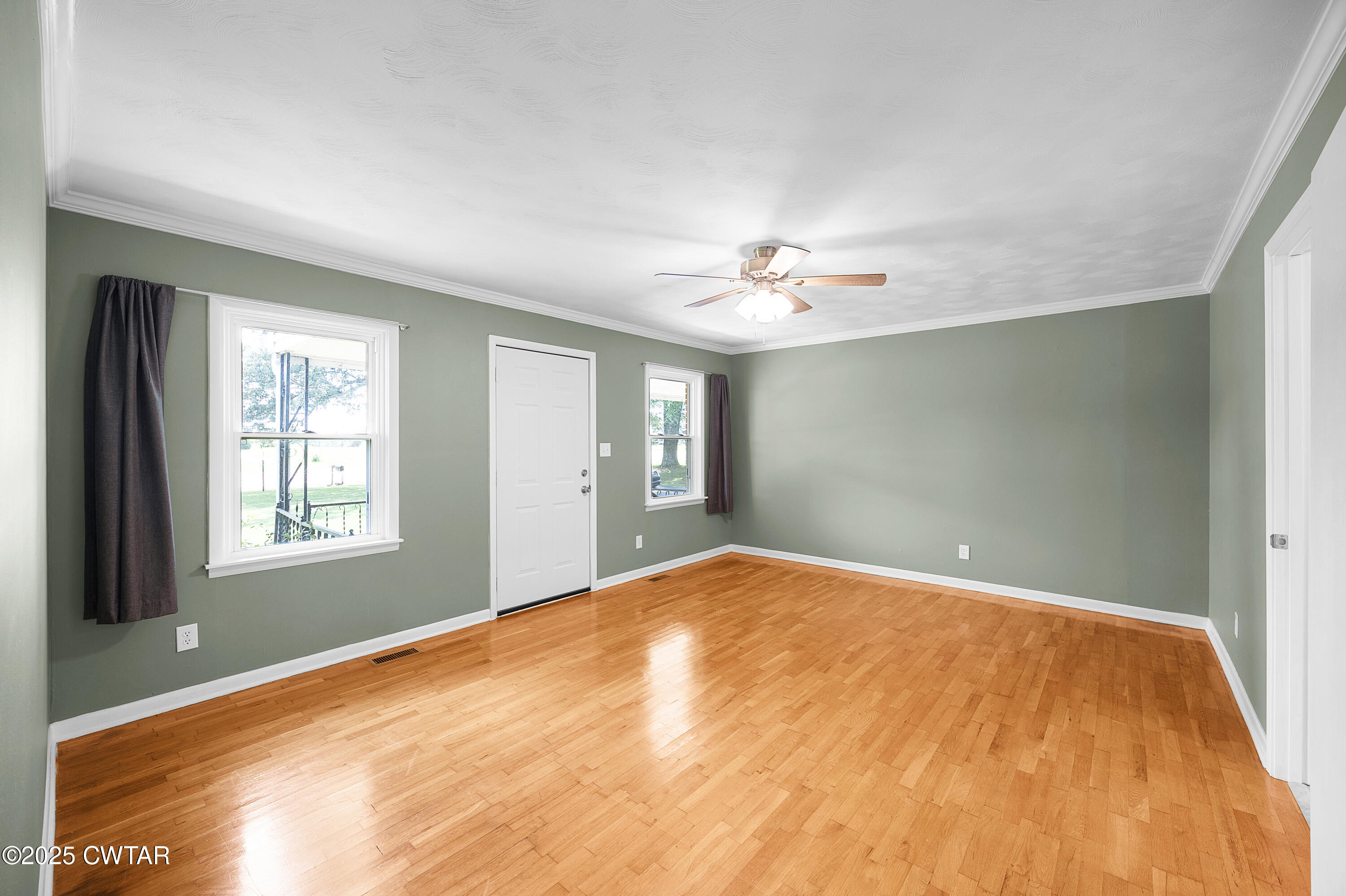 2901 Beech Bluff Road Jackson, TN 38301 - Photo 19 of 23 a view of an empty room with chandelier and a window