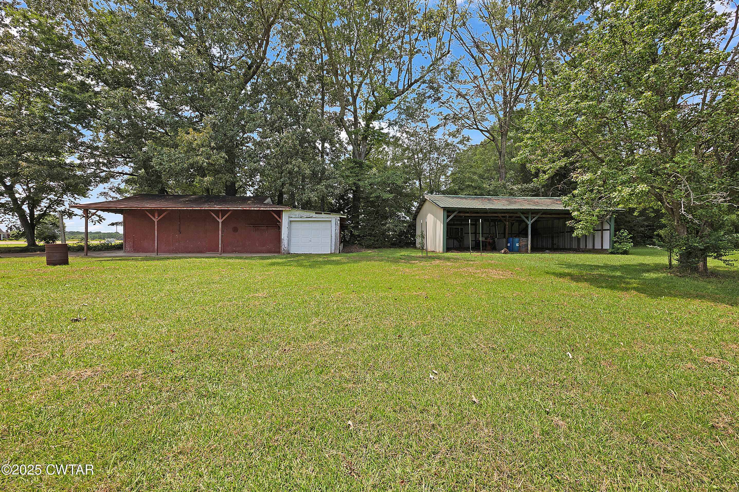 2901 Beech Bluff Road Jackson, TN 38301 - Photo 4 of 23 a view of house with yard and swimming pool