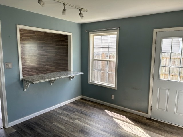 1017 Shadow Ridge Avenue Oak Grove, KY 42262 - Photo 6 of 15 an empty room with wooden floor and windows
