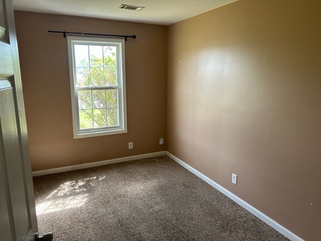 1017 Shadow Ridge Avenue Oak Grove, KY 42262 - Photo 7 of 15 an empty room with a window