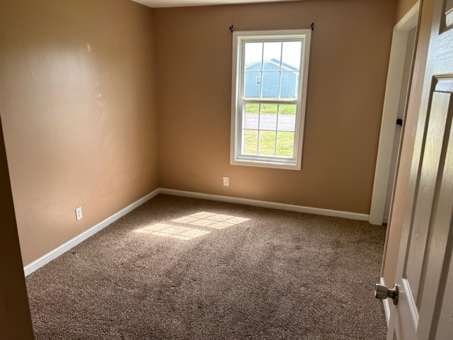 1017 Shadow Ridge Avenue Oak Grove, KY 42262 - Photo 8 of 15 an empty room with a window