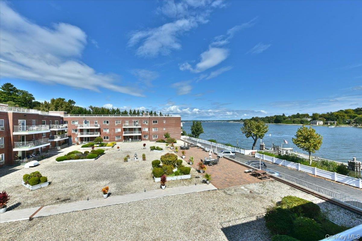 320 East Shore Road, Unit C Great Neck, NY 11023 - Photo 15 of 29 a view of a balcony with city view