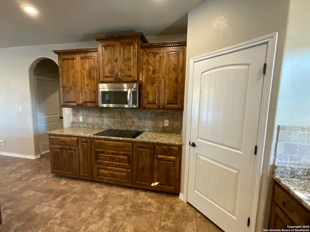 a view of a storage & utility room in a utility room