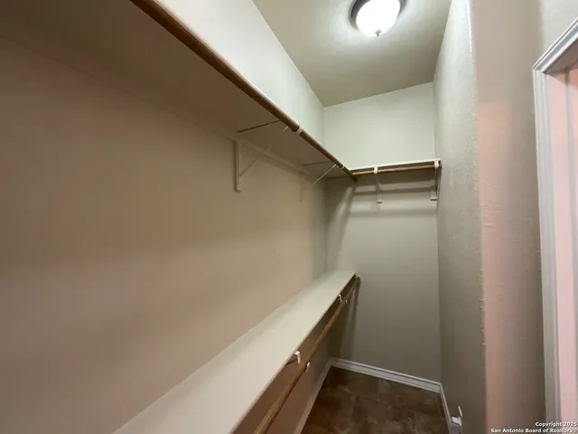 a view of an entryway with a door