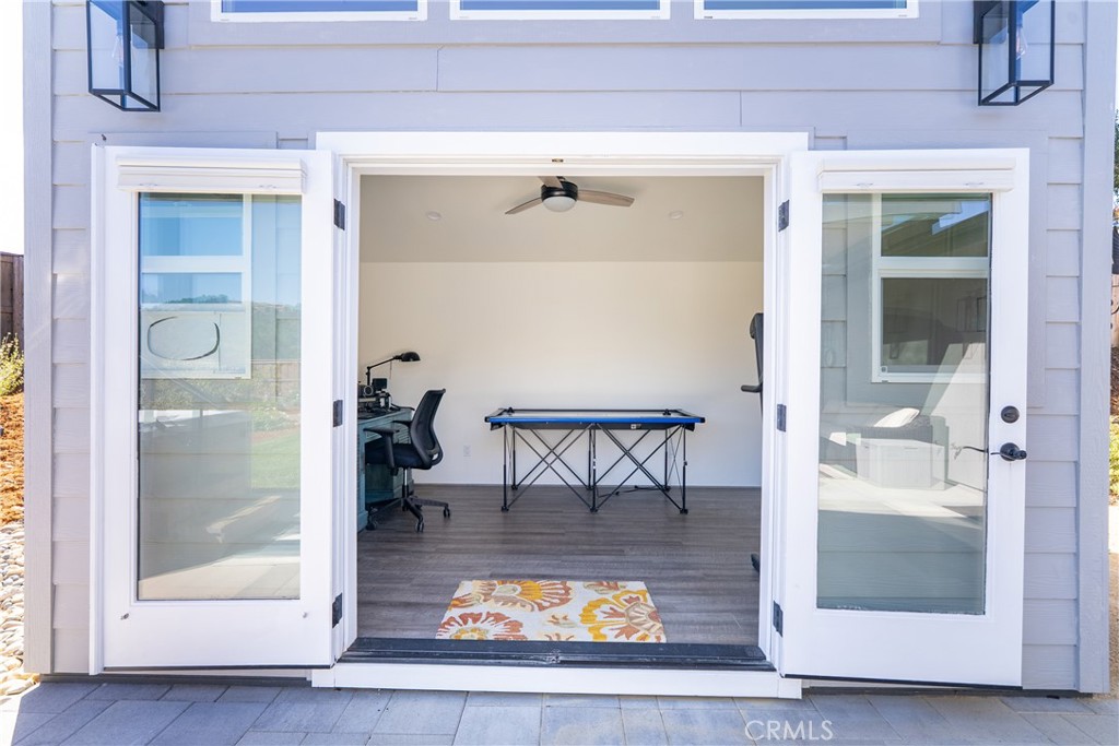 8550 El Corte Road Atascadero, CA 93422 - Photo 53 of 72 a view of a hallway and a livingroom with furniture