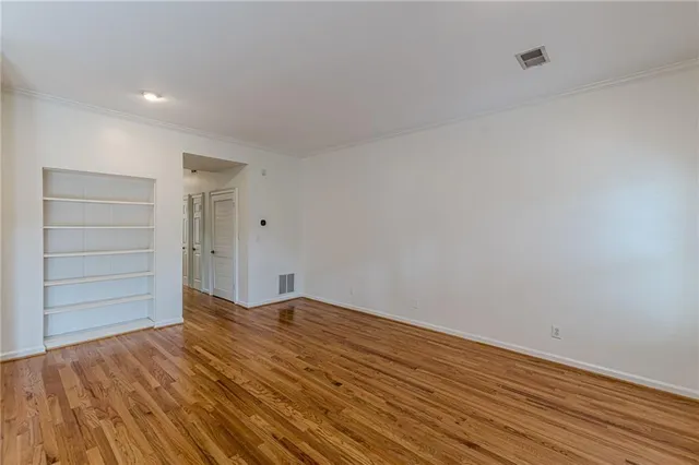 a view of room with hardwood floor