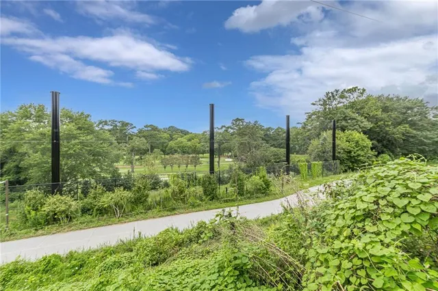 a view of empty room with a fireplace