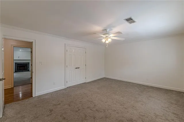 a view of a bathroom from the hallway