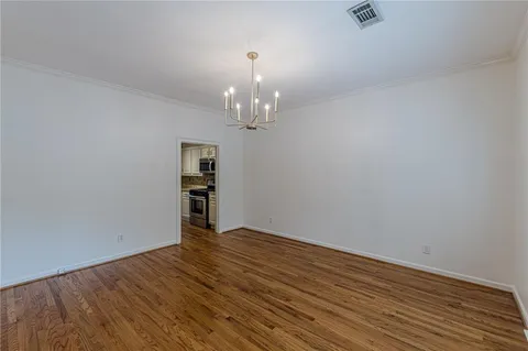 a view of a livingroom with wooden floor