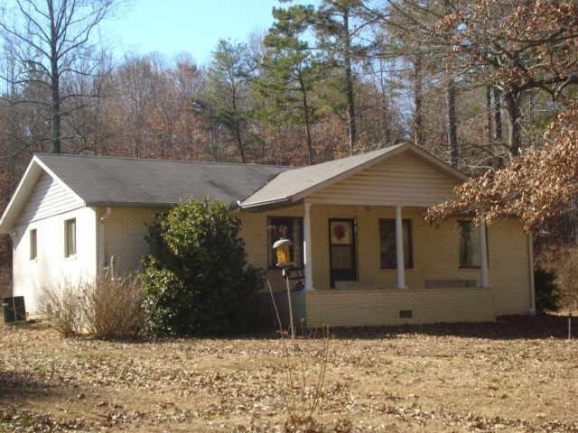 720 Hightower Road Cedartown, GA 30125 - Photo 1 of 1 a front view of a house with garden