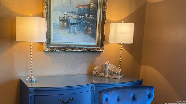 a bathroom with a sink a mirror and window