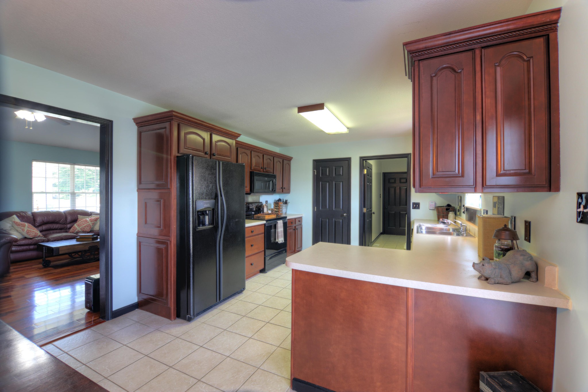 7332 Fort Apache Road Corryton, TN 37721 - Photo 5 of 13 a kitchen with stainless steel appliances granite countertop a refrigerator and a sink