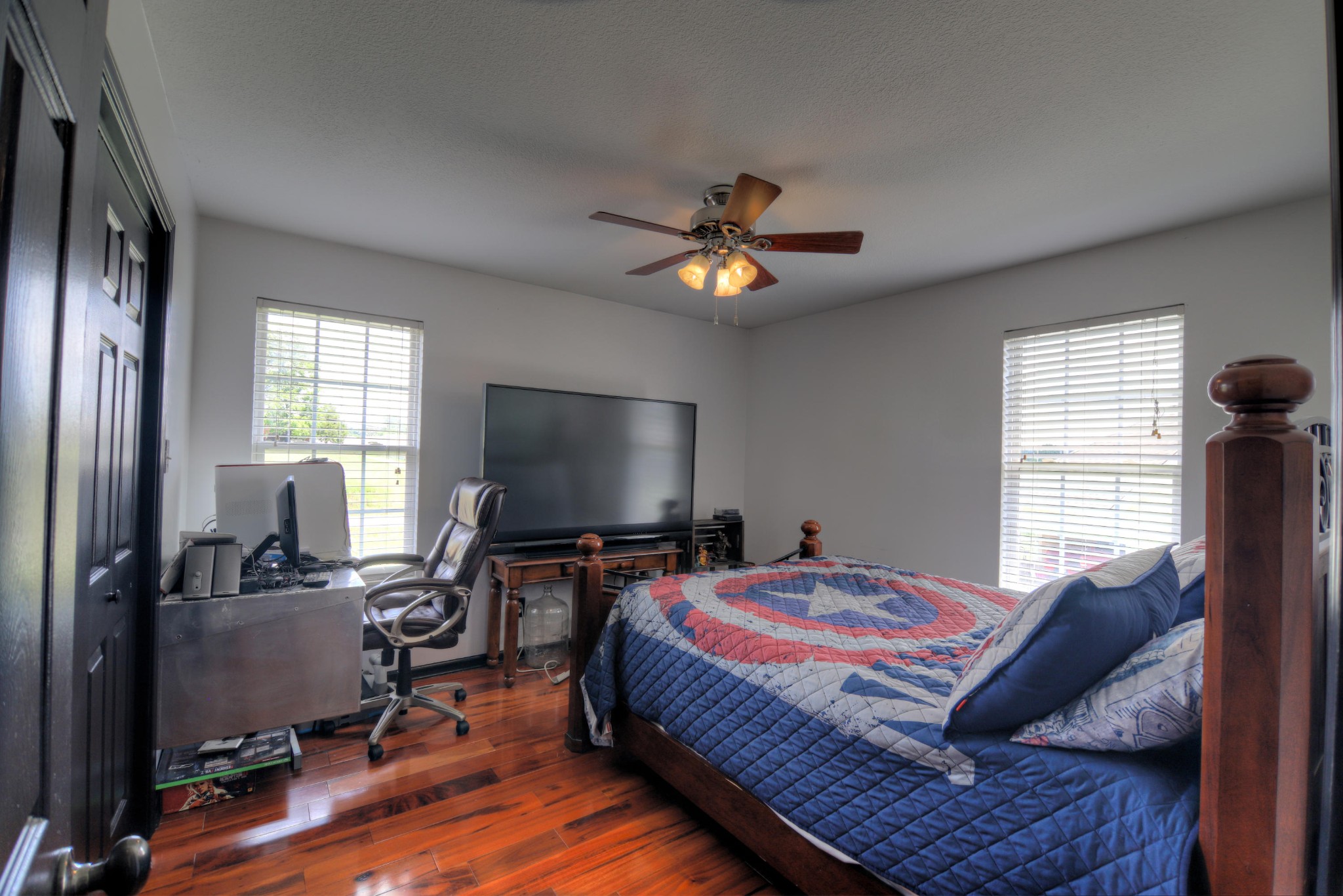 7332 Fort Apache Road Corryton, TN 37721 - Photo 10 of 13 a bedroom with a bed and a flat screen tv