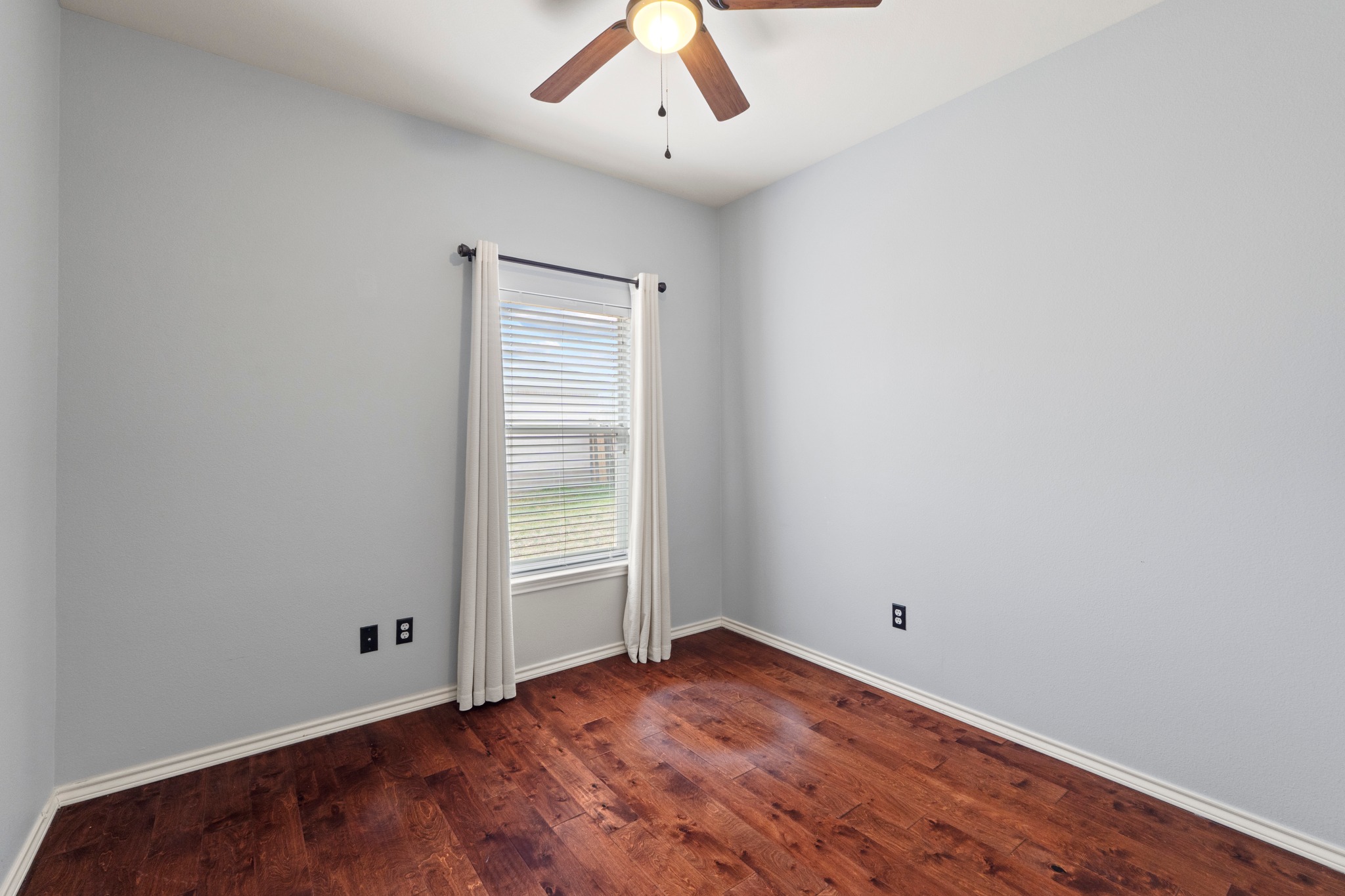11820 Dunfries Lane Austin, TX 78754 - Photo 18 of 35 an empty room with a empty space and a ceiling fan