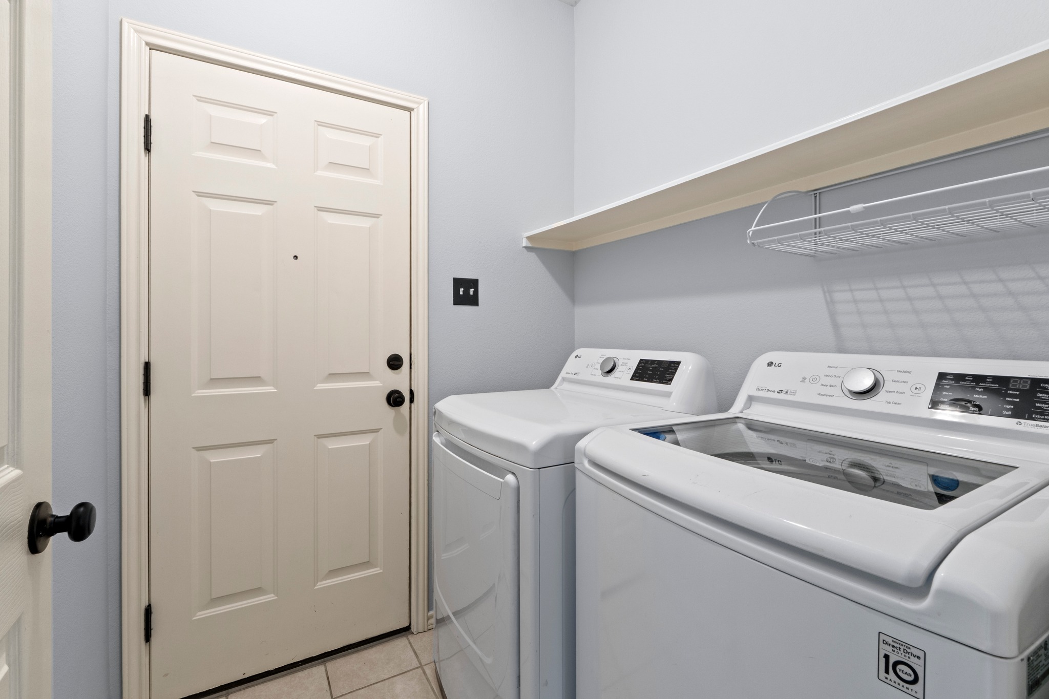 11820 Dunfries Lane Austin, TX 78754 - Photo 22 of 35 a utility room with dryer and washer