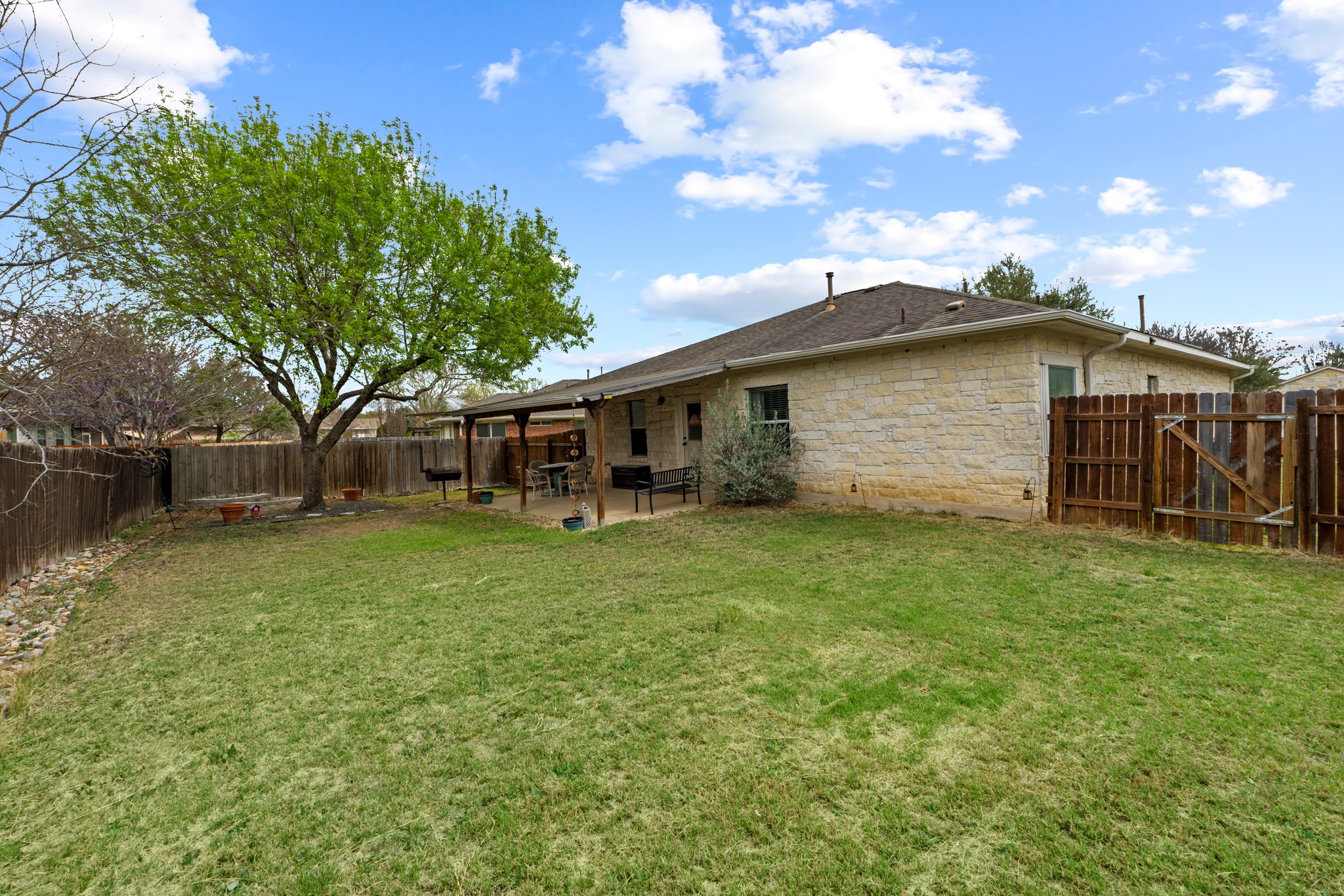 11820 Dunfries Lane Austin, TX 78754 - Photo 26 of 35 a front view of house with yard and trees