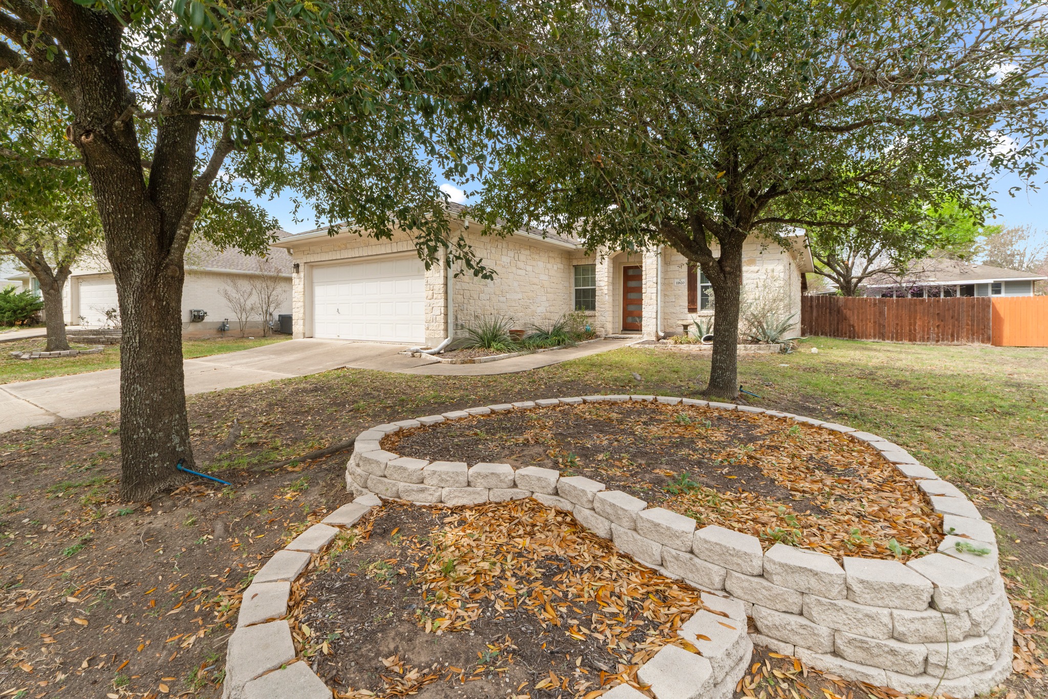 11820 Dunfries Lane Austin, TX 78754 - Photo 35 of 35 front view of a house with a yard
