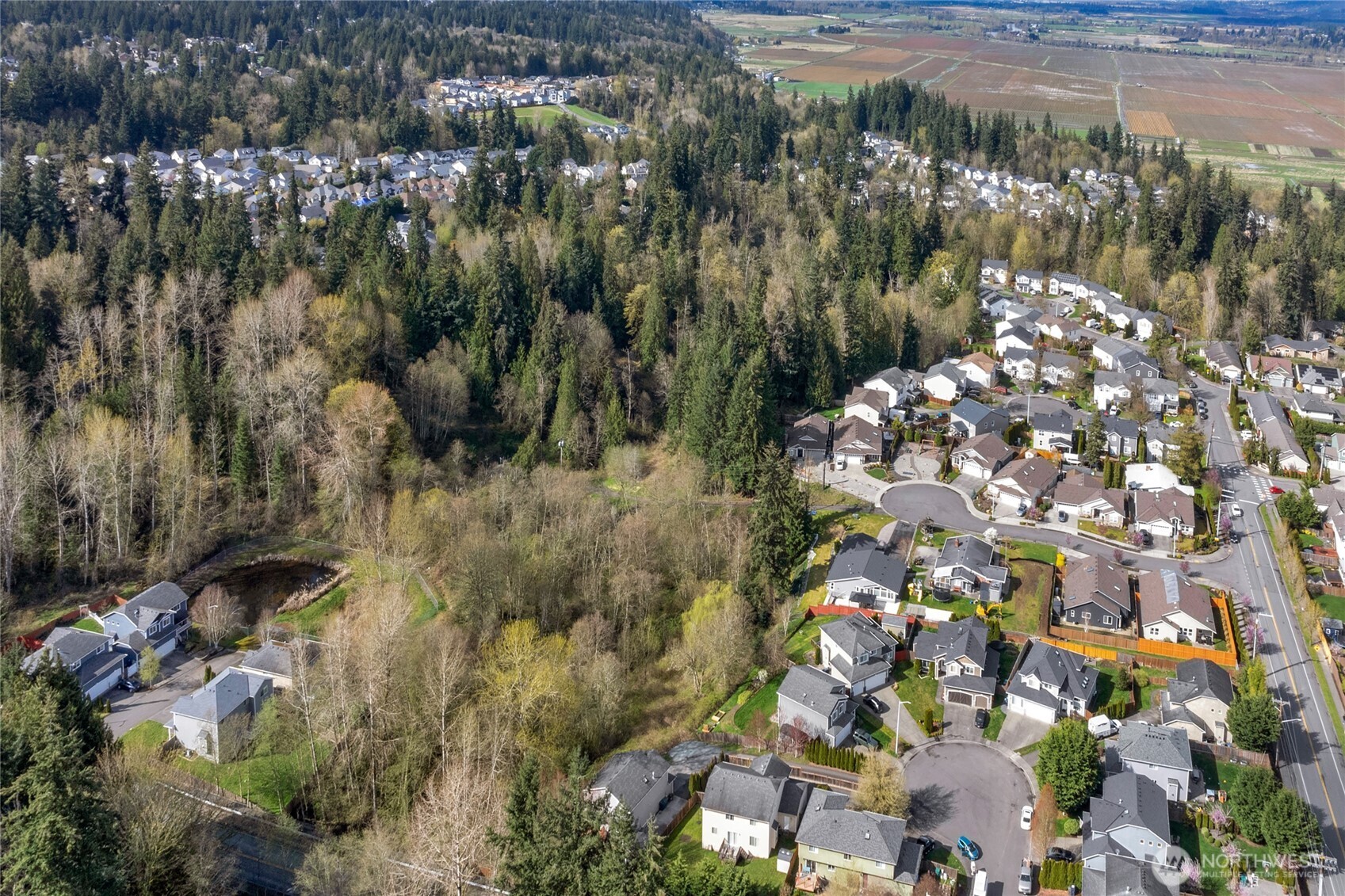 11628 50th Drive Southeast Everett, WA 98208 - Photo 34 of 37 a view of a lake with lots of trees