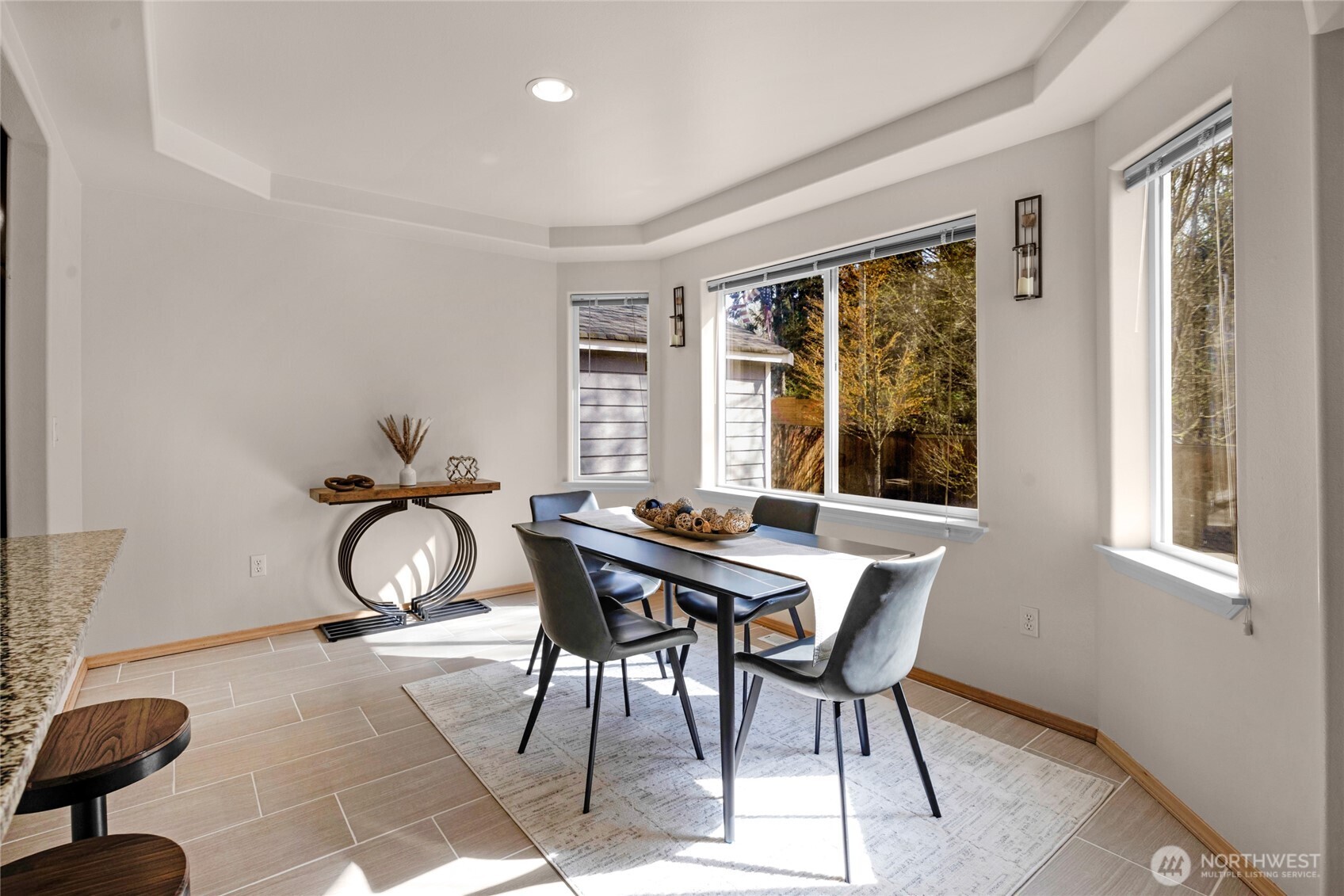 11628 50th Drive Southeast Everett, WA 98208 - Photo 9 of 37 a view of a dining room with furniture window and wooden floor