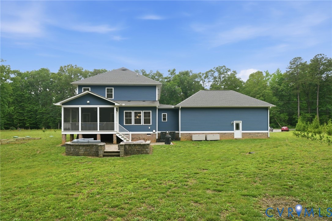 7598 Rural Point Road Mechanicsville, VA 23116 - Photo 33 of 41 a front view of a house with a garden