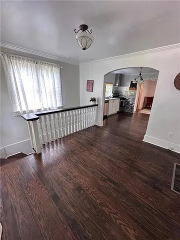 a view of livingroom with furniture and windows