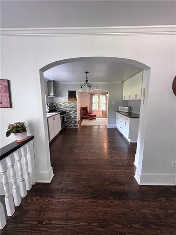 a view of a living room and a kitchen