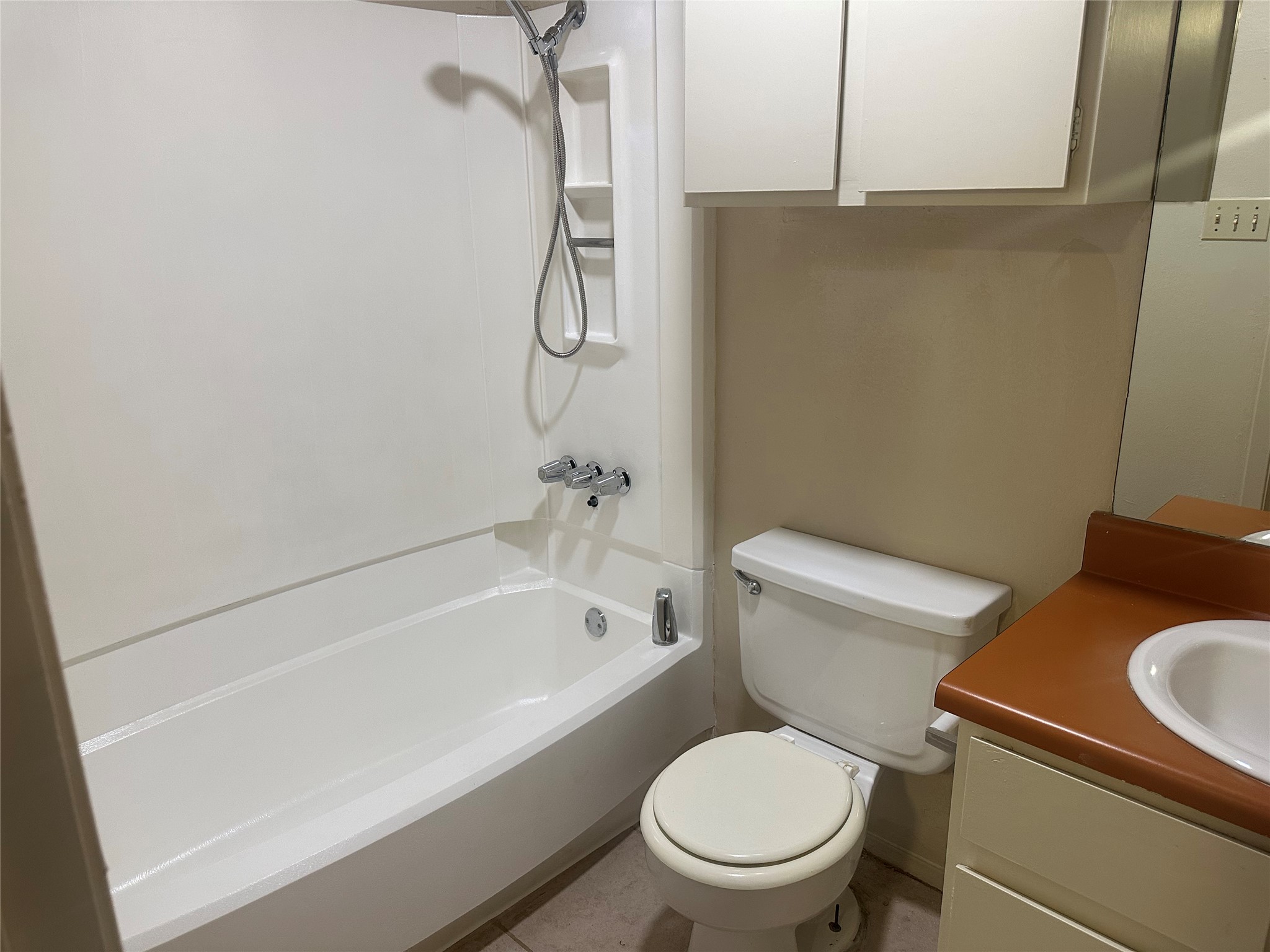 2602 South Bagdad Road, Unit A Leander, TX 78641 - Photo 9 of 26 A well-maintained bathroom offers essential fixtures for daily routines.
