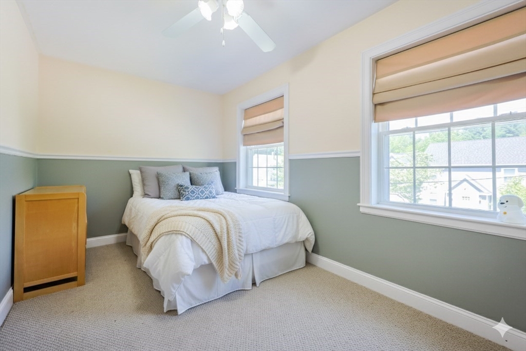 8 A Whitins Road Sutton, MA 01590 - Photo 18 of 26 a bedroom with a bed and a window