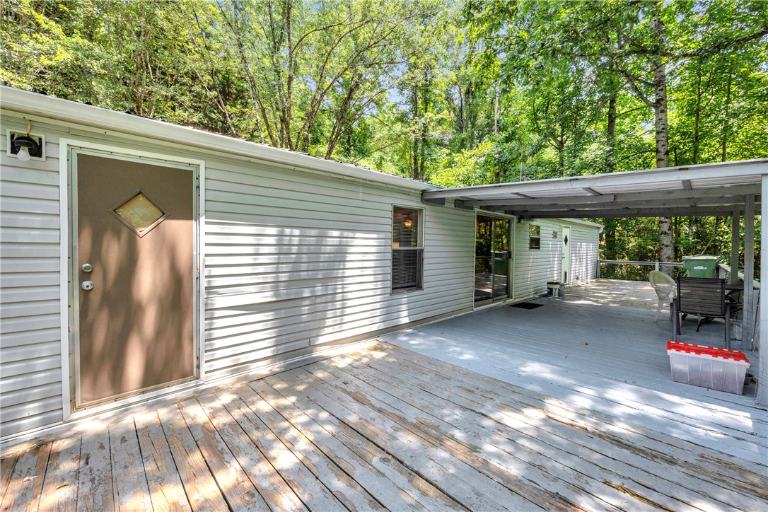 162 Newberry Road Walhalla, SC 29691 - Photo 32 of 50 Wooded lot offers a private outdoor deck and covered patio for peaceful enjoyment.