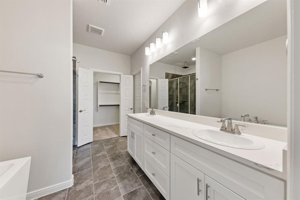 1844 Rosedale Avenue Van Alstyne, TX 75495 - Photo 12 of 26 Plenty of room for two in this wonderful owner's bath.