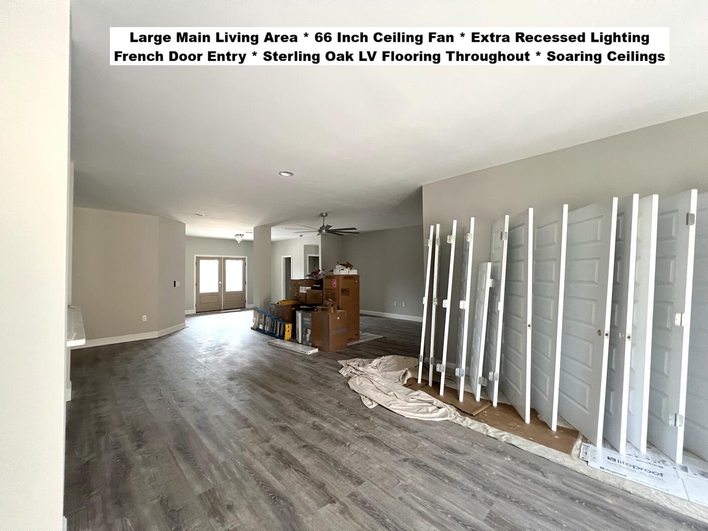 445 Scooter Cove Crestview, FL 32539 - Photo 5 of 12 a view of a room with lots of appliances and wooden floor
