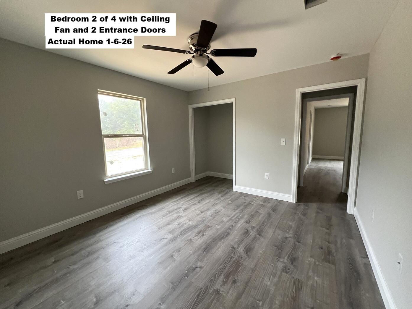 445 Scooter Cove Crestview, FL 32539 - Photo 6 of 12 a view of an empty room and window