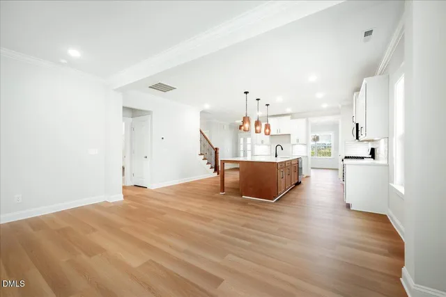 a view of kitchen with wooden floor