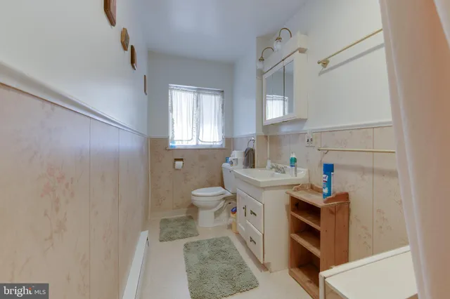 a room with cabinets a washer and dryer