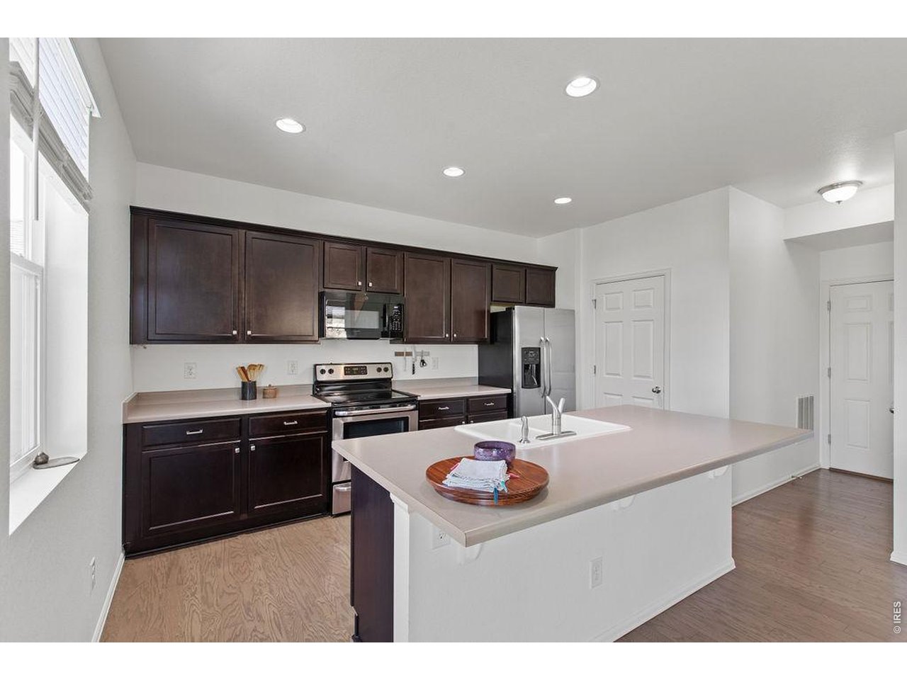 6792 Covenant Court Timnath, CO 80547 - Photo 12 of 40 Large kitchen island