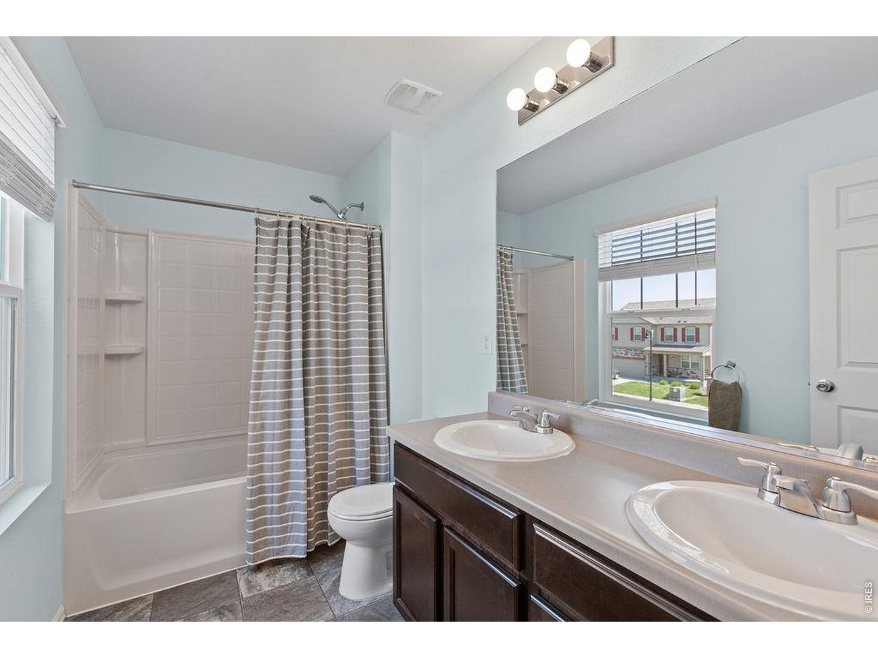 6792 Covenant Court Timnath, CO 80547 - Photo 26 of 40 Guest Bath: dual sinks
