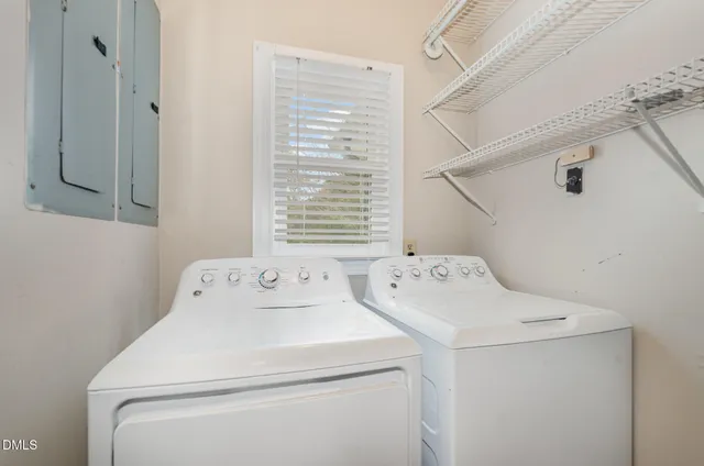 a utility room with dryer and washer
