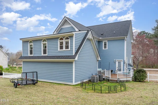 a backyard of a house with seating space