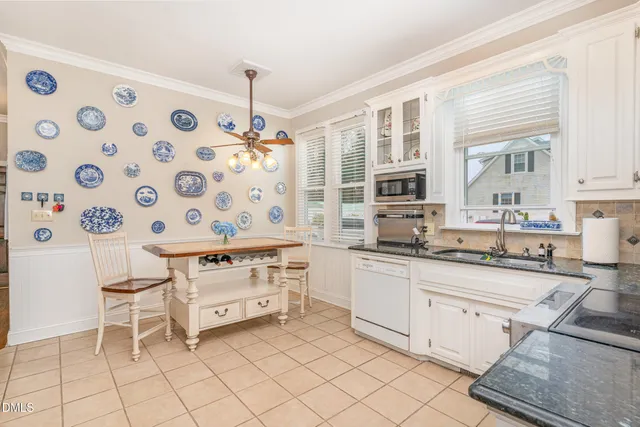 a kitchen with a cabinets and appliances