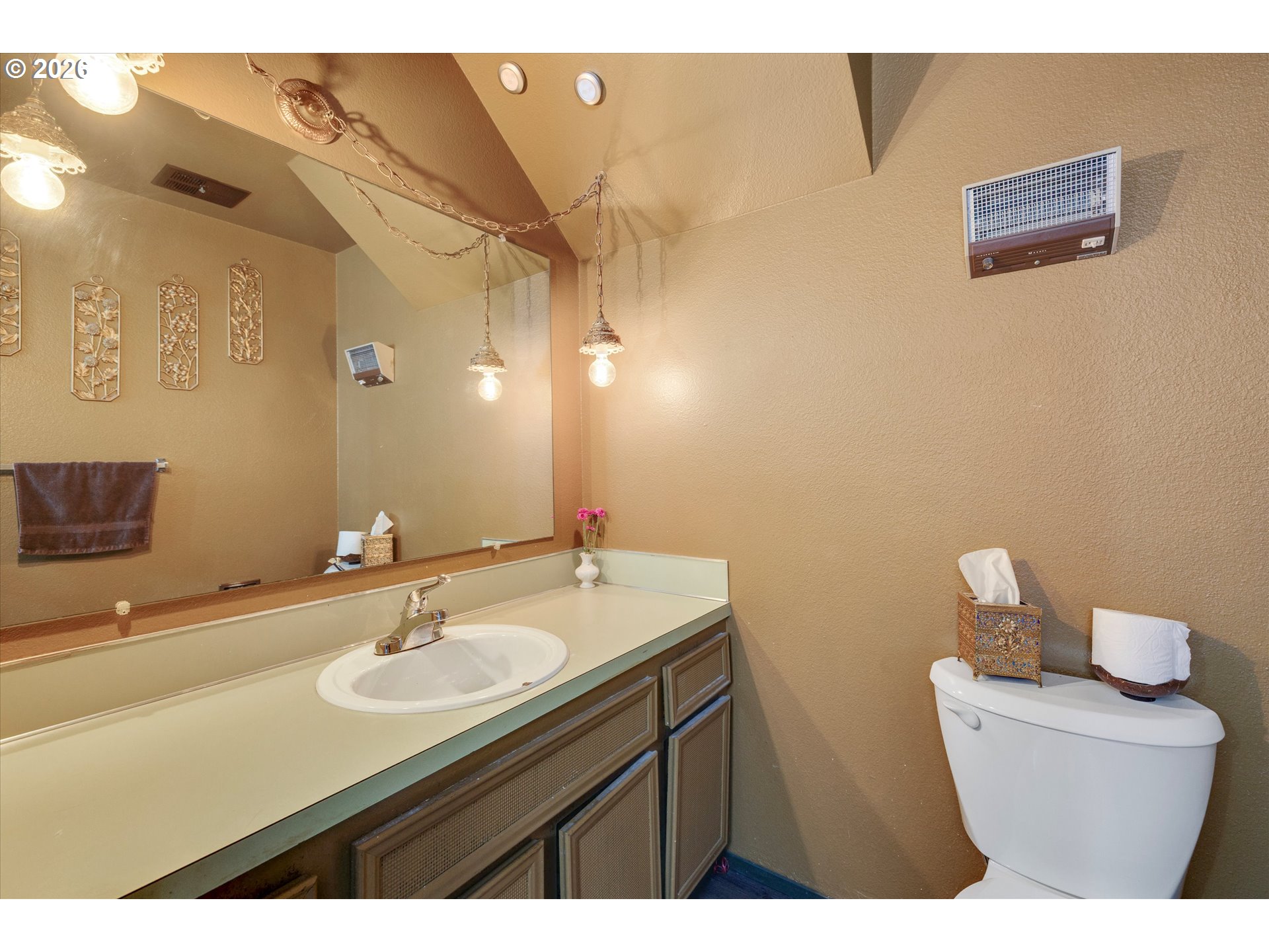 831 Northeast 90th Avenue Portland, OR 97220 - Photo 11 of 25 a bathroom with a sink toilet and a mirror
