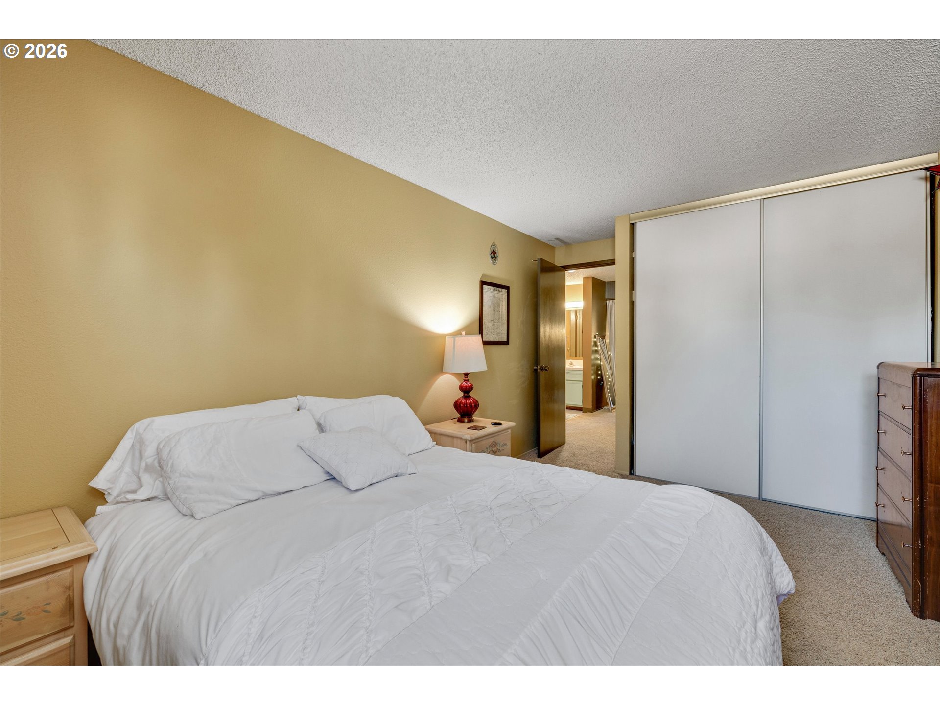 831 Northeast 90th Avenue Portland, OR 97220 - Photo 13 of 25 a bedroom with a bed and a closet