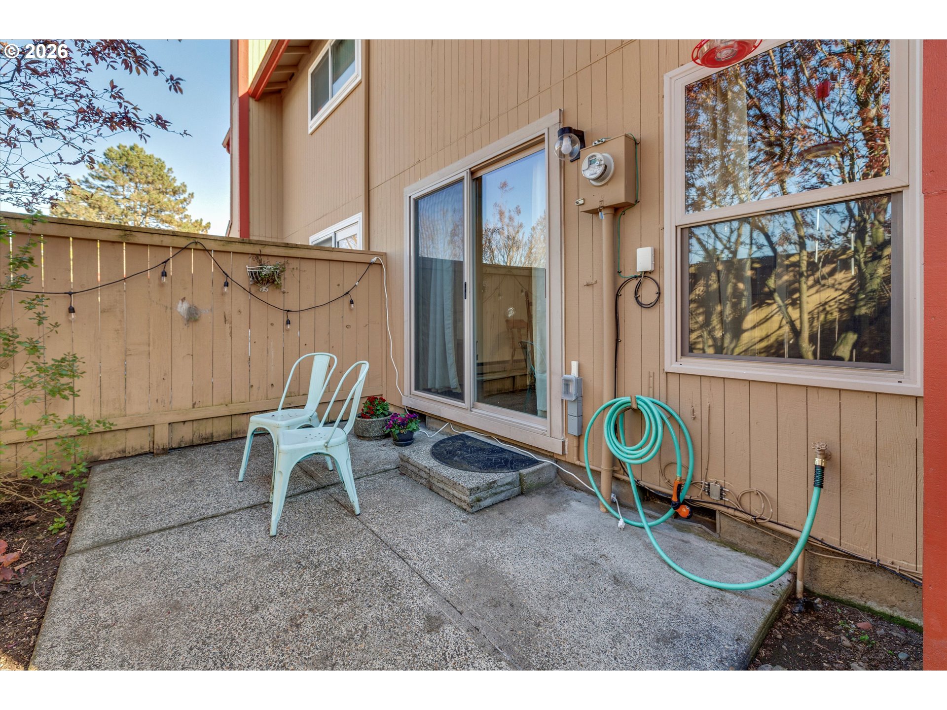 831 Northeast 90th Avenue Portland, OR 97220 - Photo 22 of 25 a couple of chairs sitting in patio of a house
