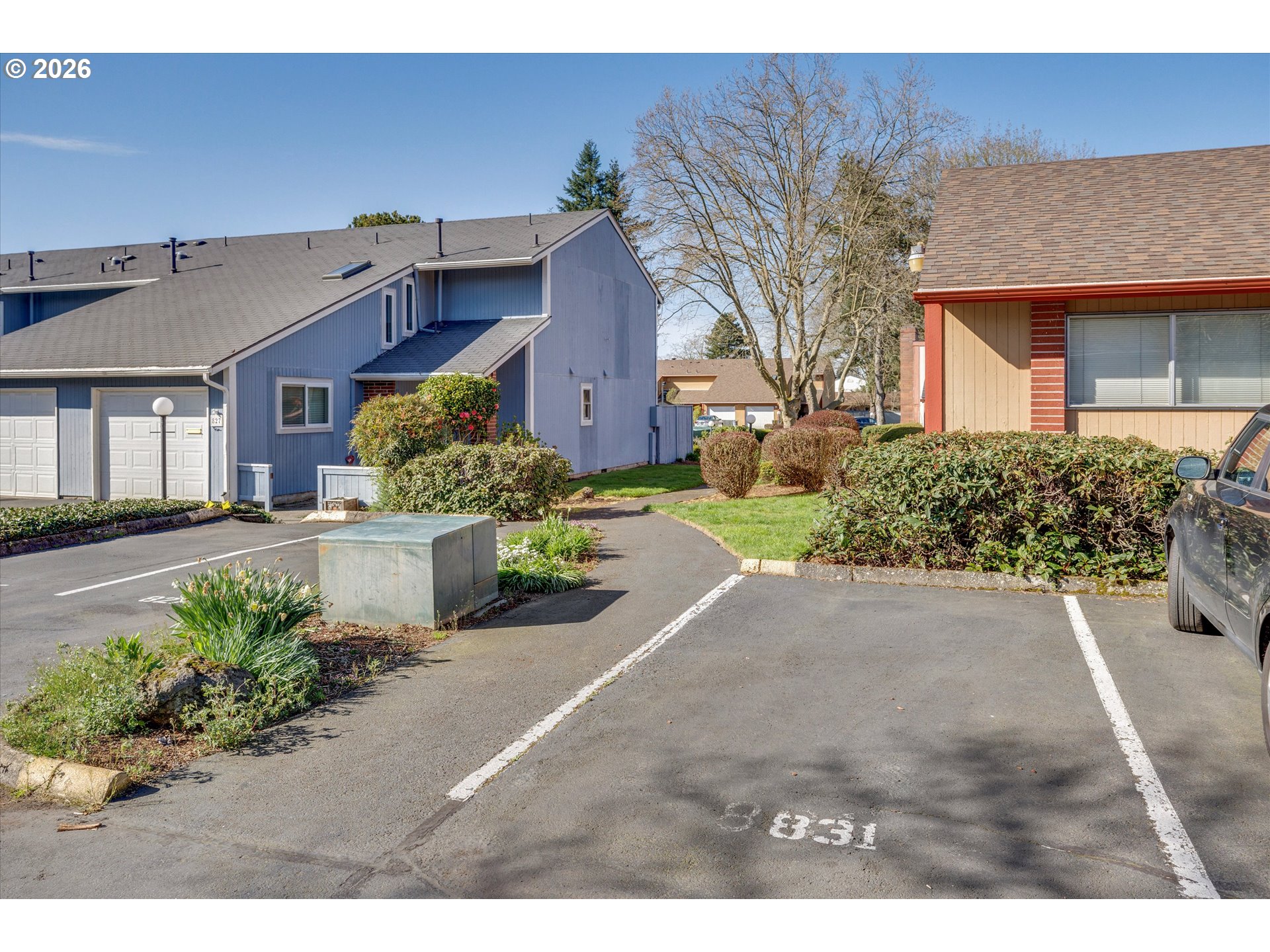 831 Northeast 90th Avenue Portland, OR 97220 - Photo 24 of 25 a front view of a house with a yard and outdoor seating
