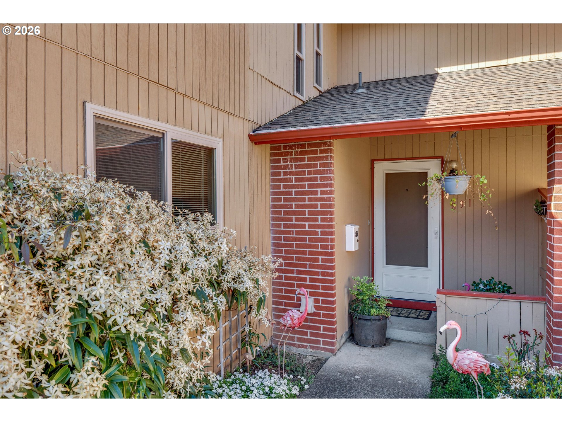 831 Northeast 90th Avenue Portland, OR 97220 - Photo 3 of 25 a view of a entryway door front of house