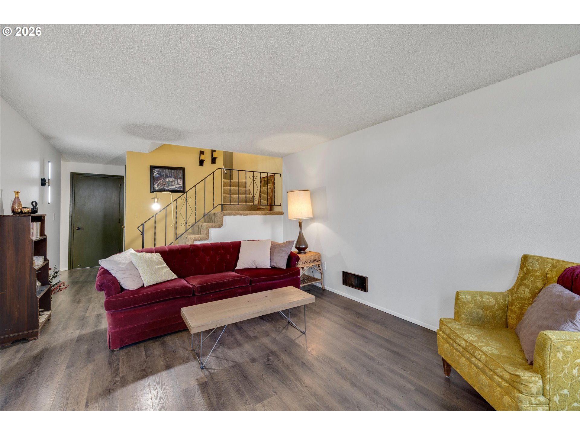 831 Northeast 90th Avenue Portland, OR 97220 - Photo 9 of 25 a living room with furniture and a wooden floor