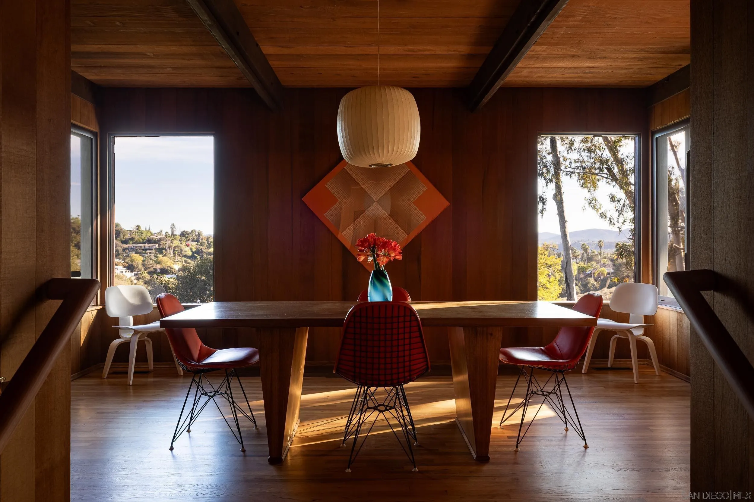 2411 Canyon Road Escondido, CA 92025 - Photo 11 of 41 a view of a dining room with furniture window and wooden floor
