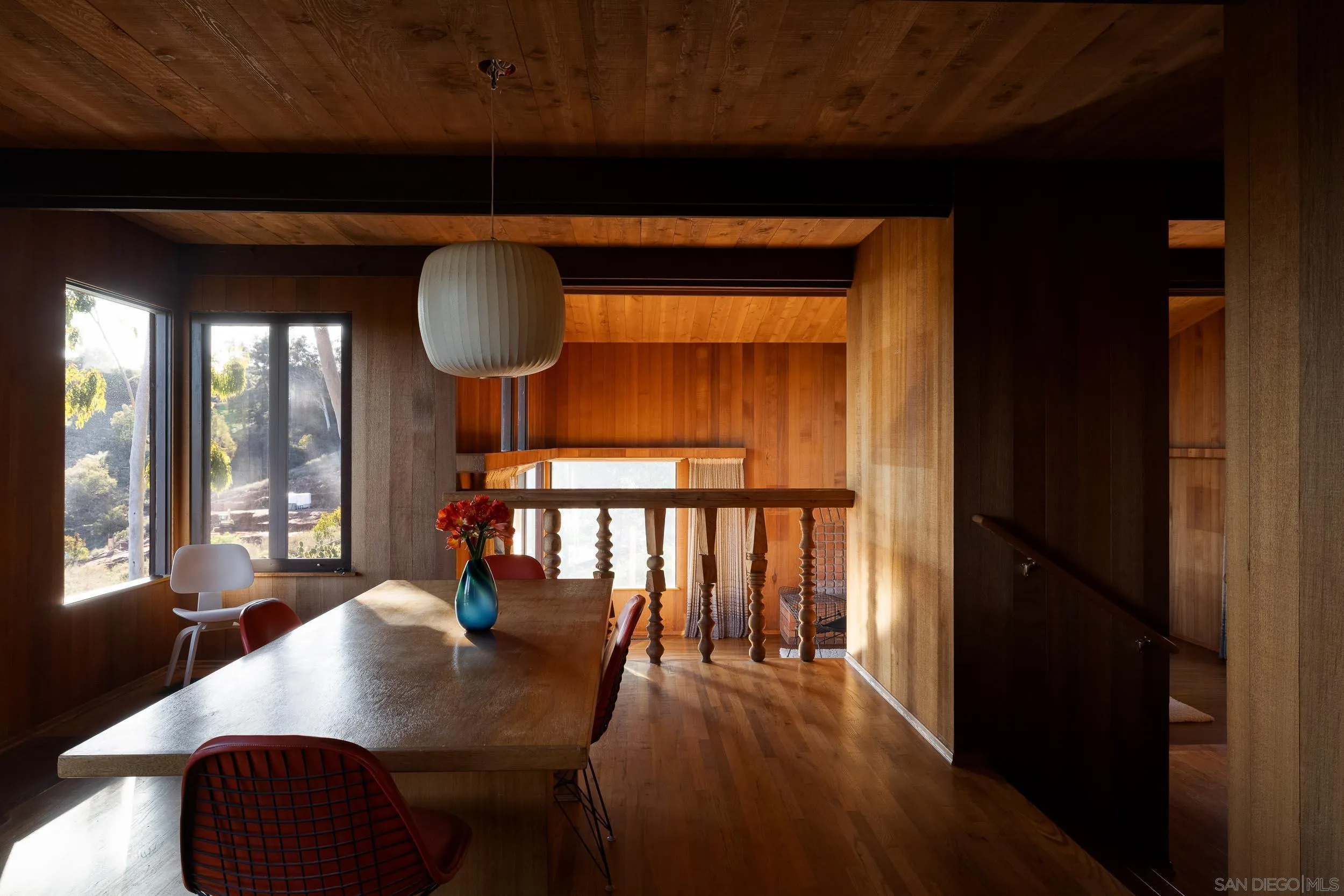 2411 Canyon Road Escondido, CA 92025 - Photo 12 of 41 a view of a dining room with furniture window and wooden floor